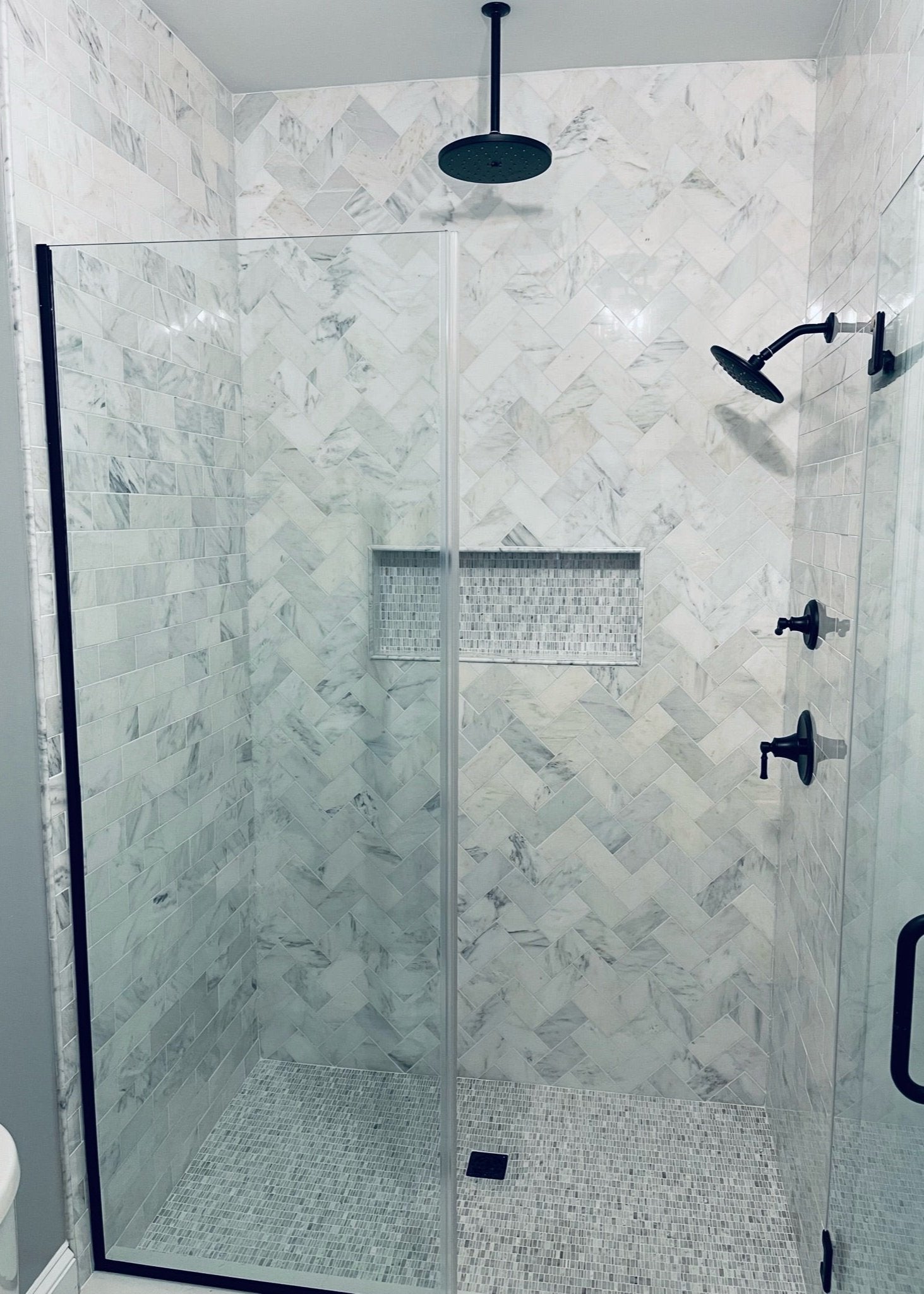 a shower install with chevron pattern