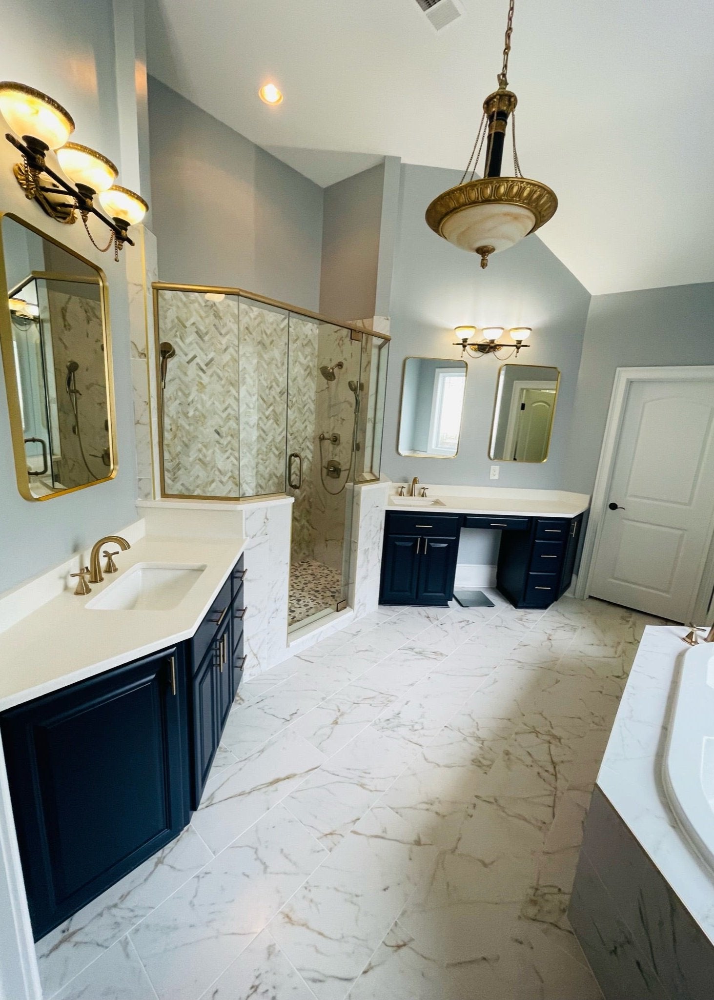 A bathroom remodel with tile flooring