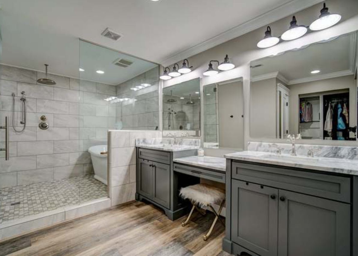 a bathroom remodel with new flooring and shower install