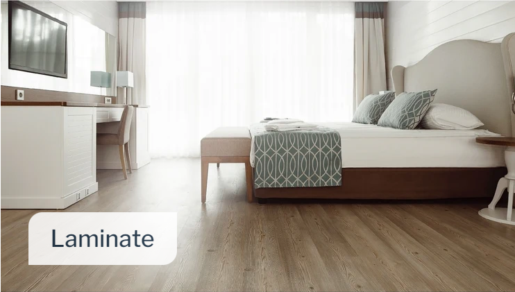 This is a picture of a hotel room with laminate flooring