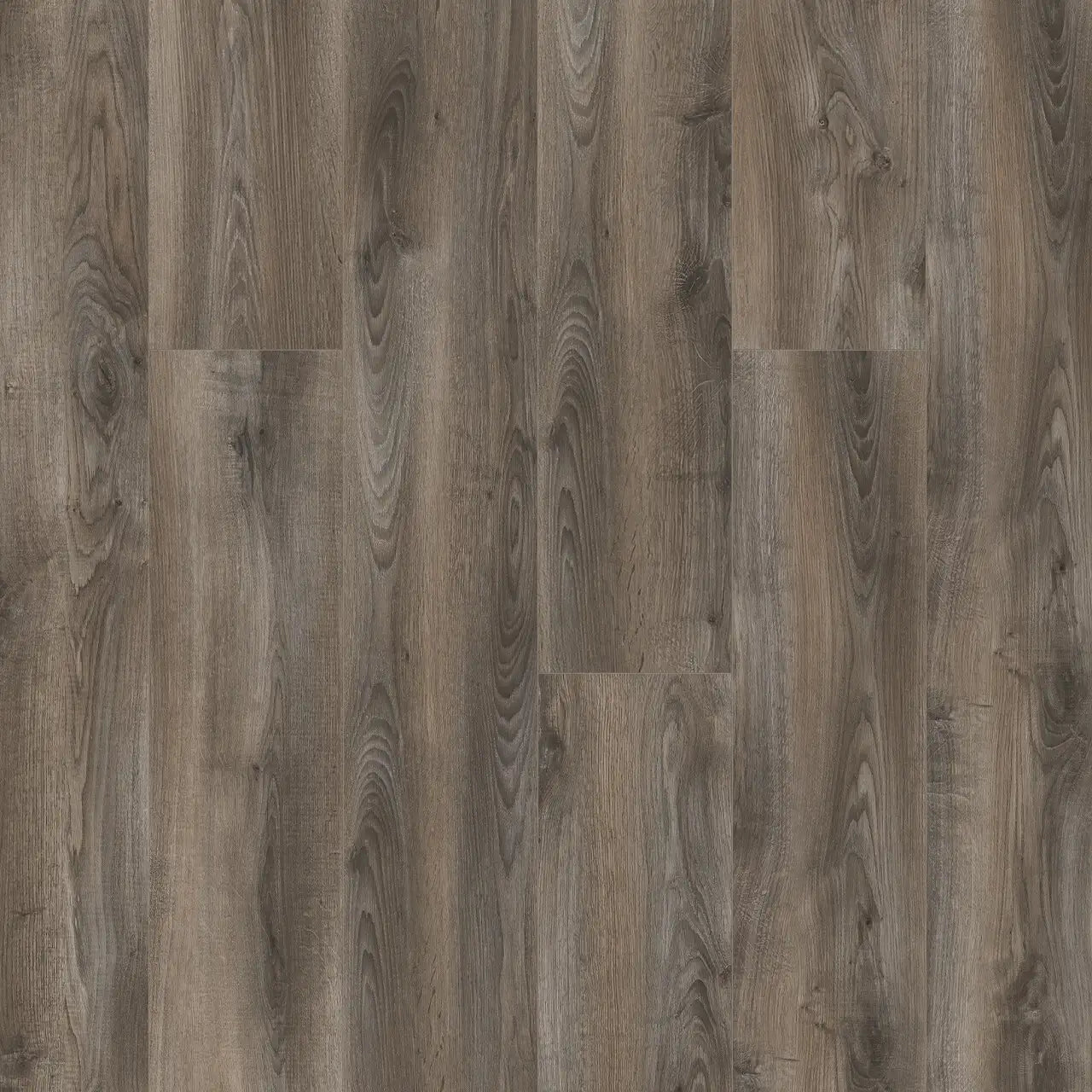 This is an up-close image of the laminate floor woodlux in the color costa brava