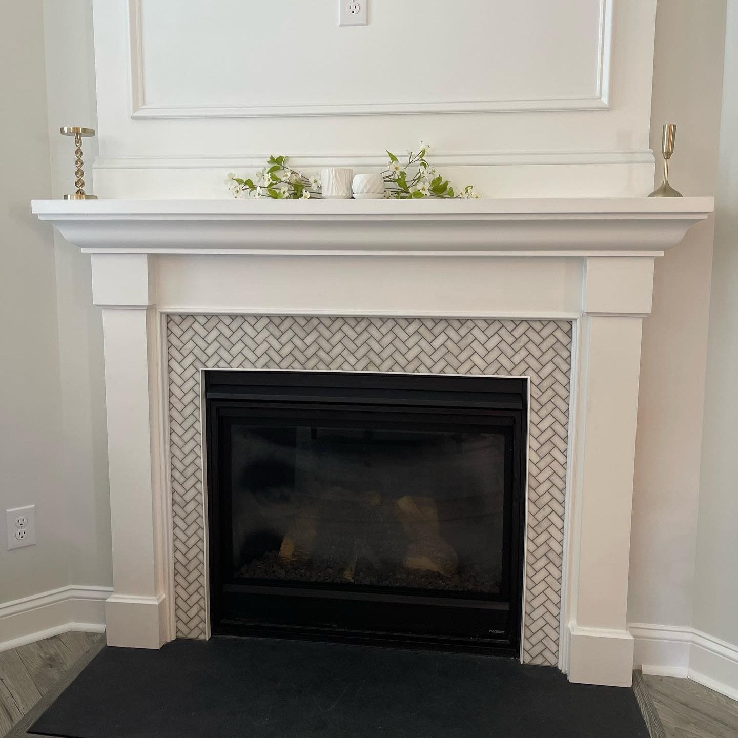 a fireplace with chevron pattern