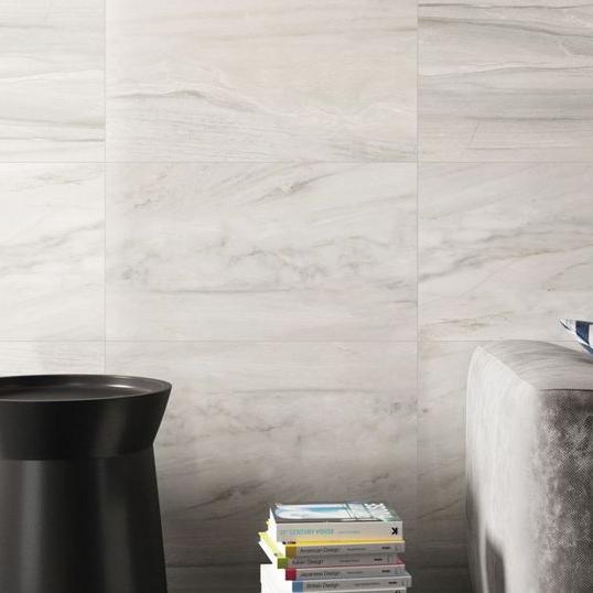 a display image with a black side table of Serene 12x24 white tile