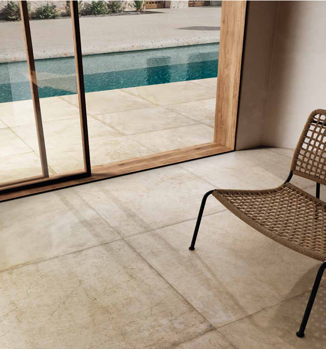 This is a room scene of a living room extending to an outdoor patio area.