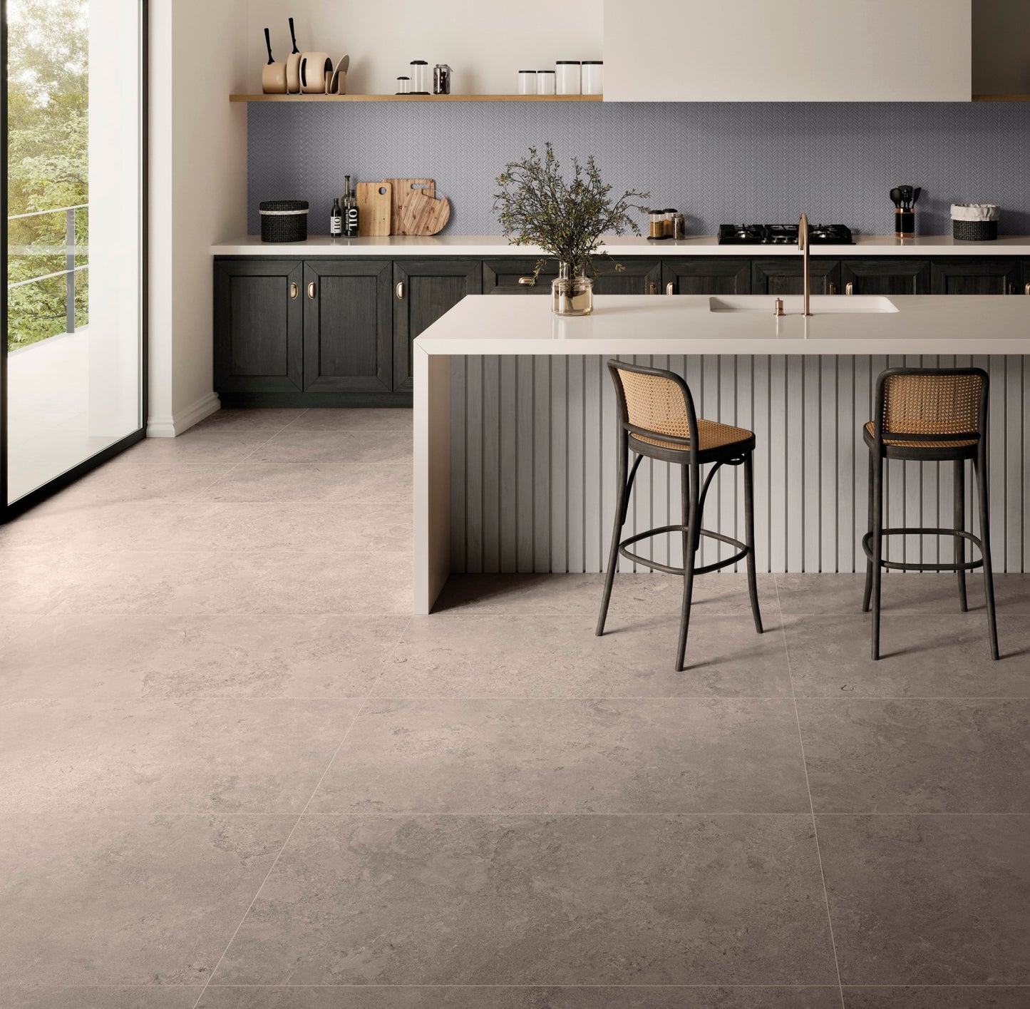This is a kitchen room scnen with blakc cabinets and a blue backsplash. The tile flooring is NOrian in the color fendi