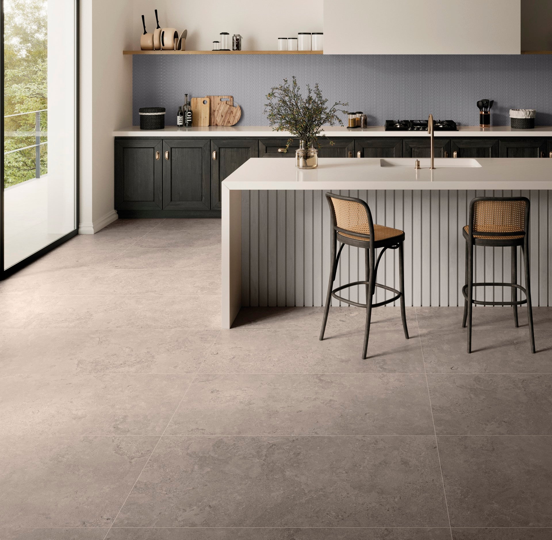 This is a kitchen room scnen with blakc cabinets and a blue backsplash. The tile flooring is NOrian in the color fendi