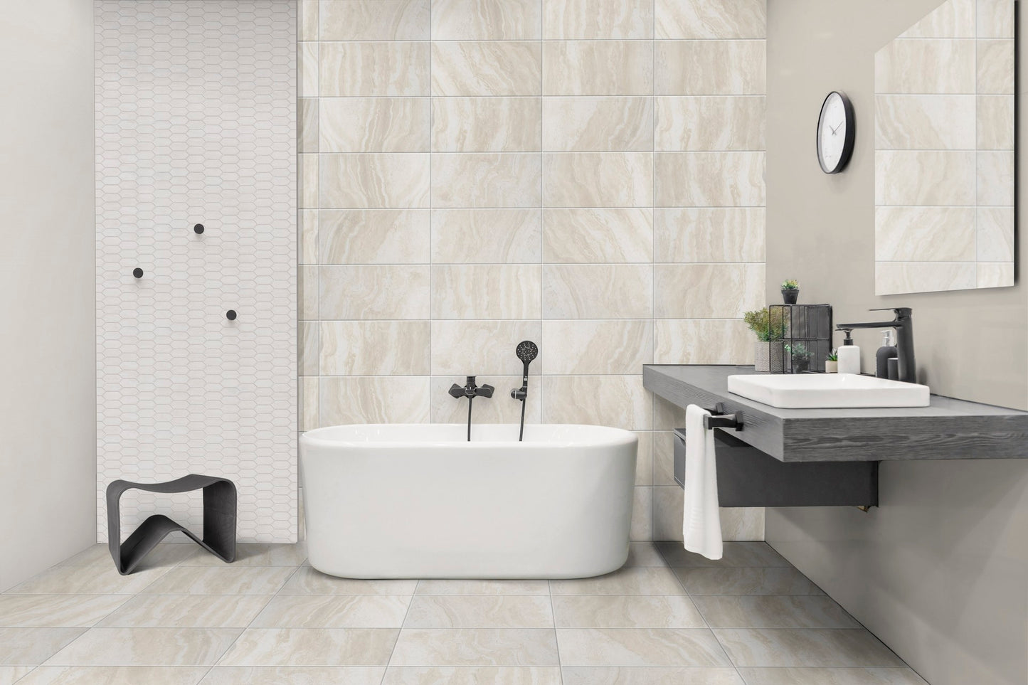 This is a room scene of a bathroom with a single tub with rocia di roma tile in the color beige