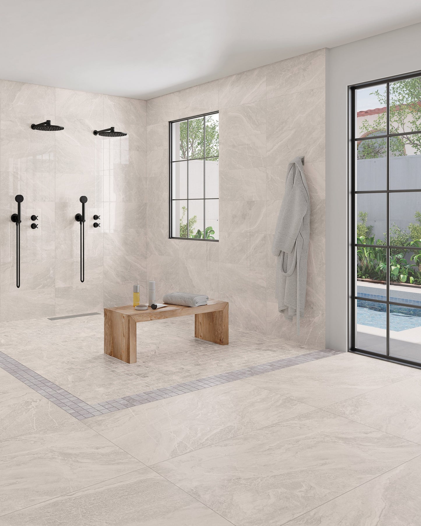 This is a room scene of a zero entry shower with double shower heads. There is a wooden bench inside the shower. The tile floor is storm in the color white.