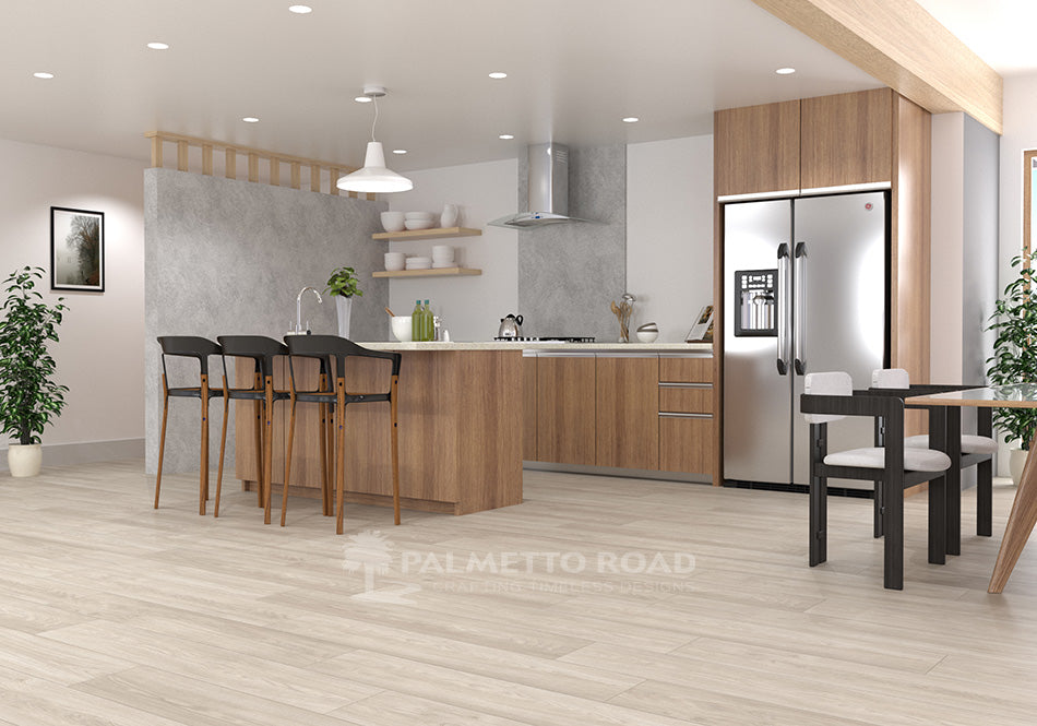 This is a kitchen room scene with natural wood cabinets and black barstools. The flooring is a laminate called trailblazer in the color plateau point