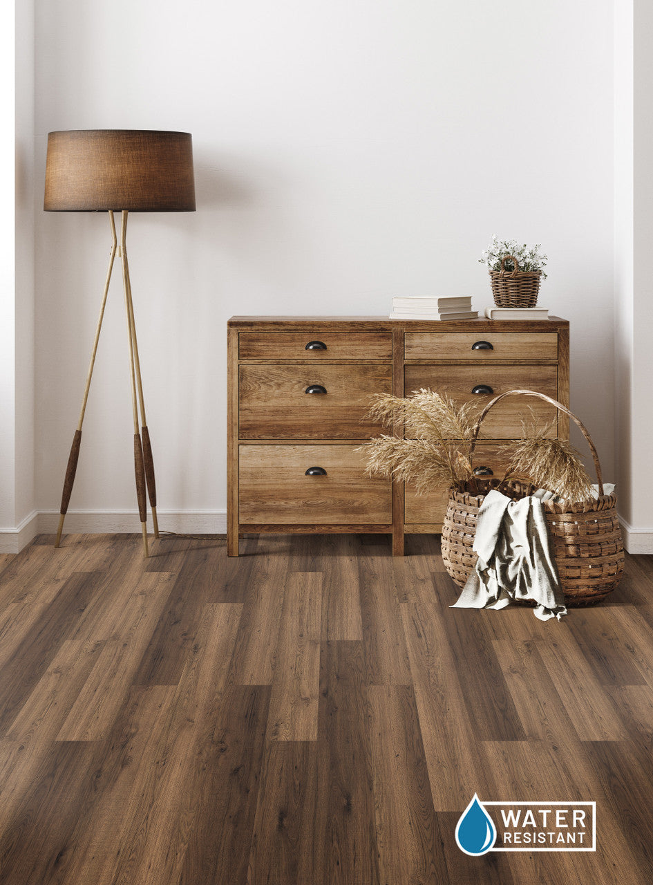 This is a room scene of entry way with light colored wood furniture.