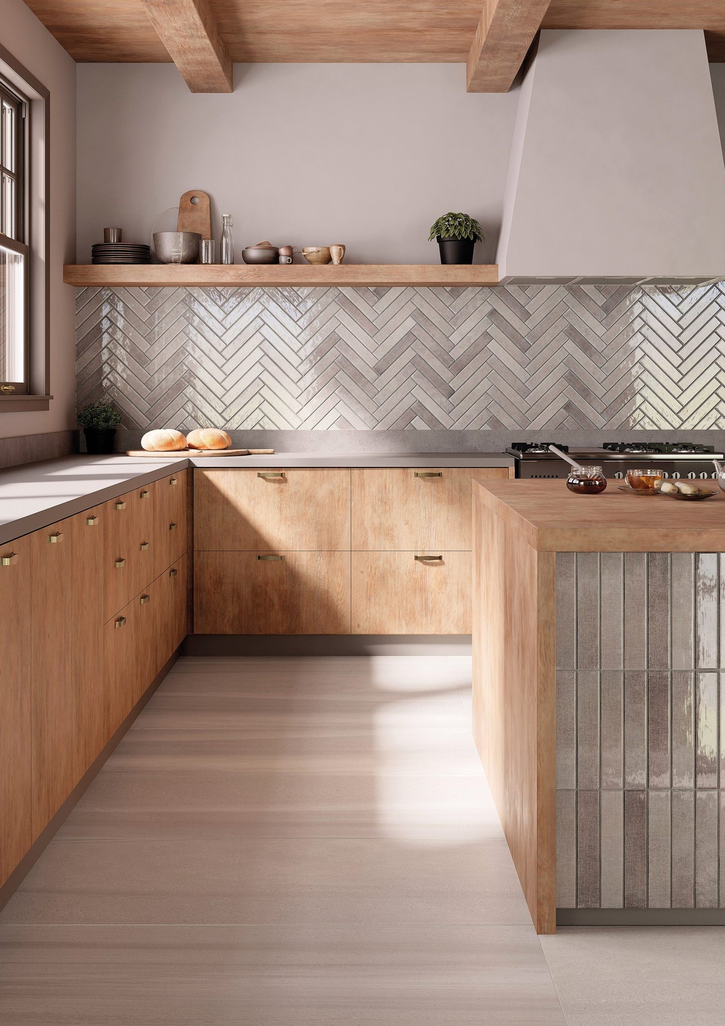 This is a room scene of a kitchen of lighthouse in the color sand used as a backsplash in a cheveron pattern