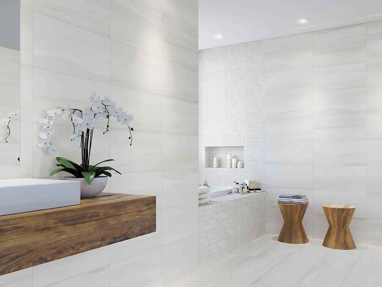 This is a bathroom scene using linear stone white with wood accents