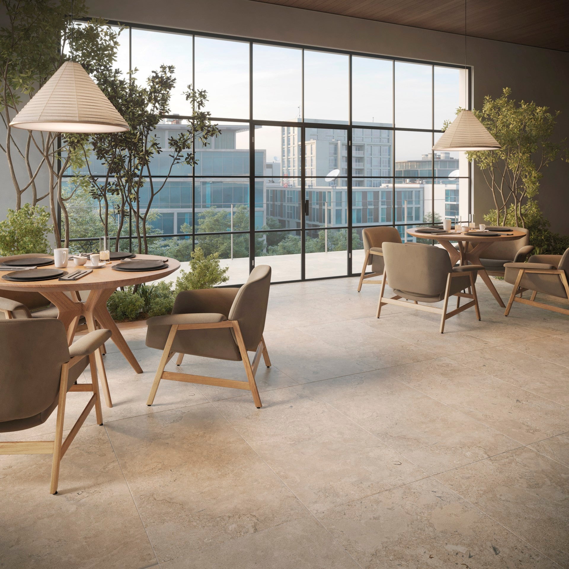 This is a room scene of a dining room with open windows and wodden modern furniture. The tile flooring is Norian in the color sand