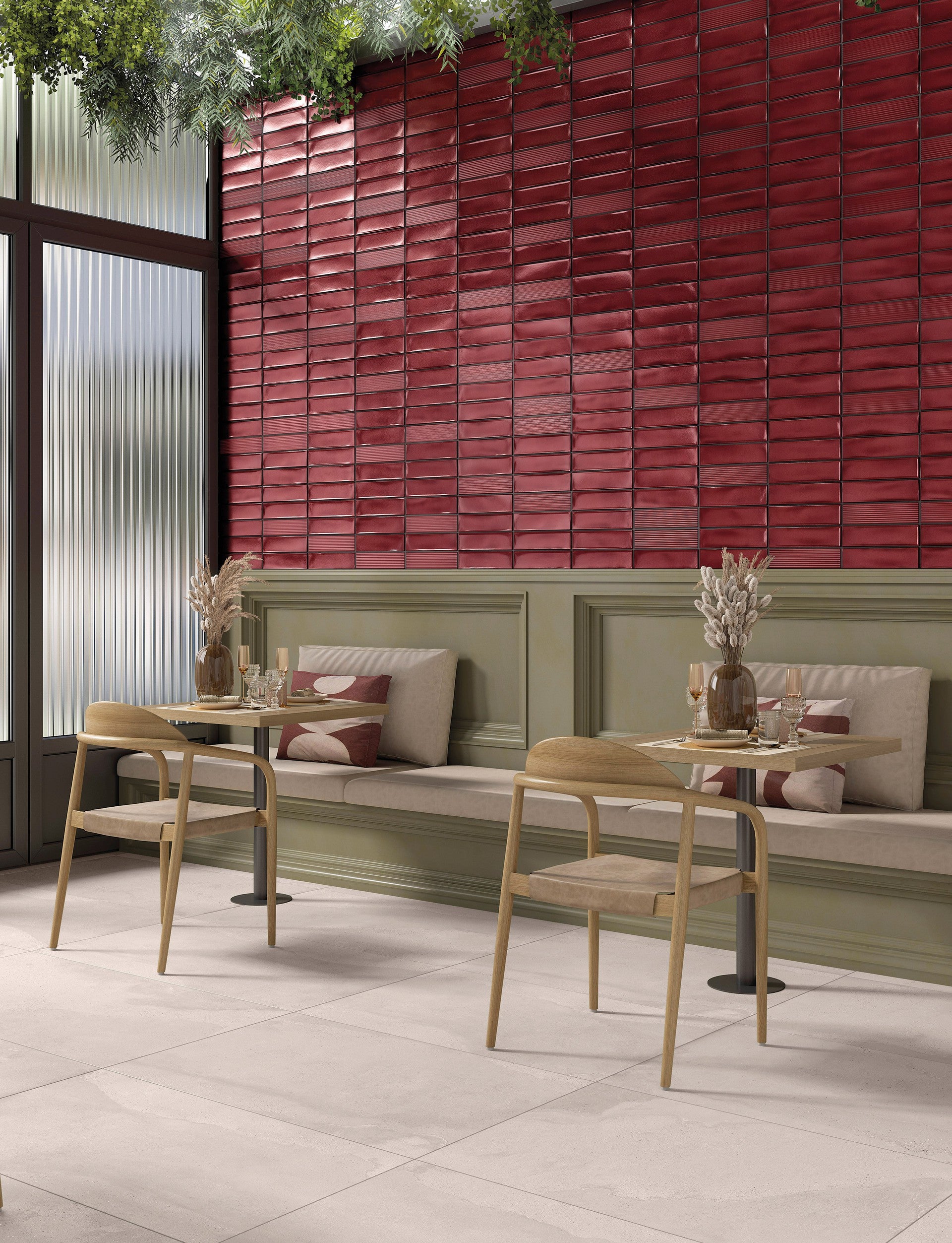 This is a room scene of a restaurant with tile flooring portofino in the color mist. The accent wall is red subway tile 