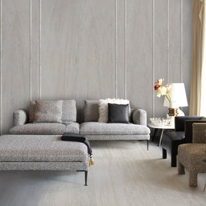 grey couches with travertino grigio tile flooring