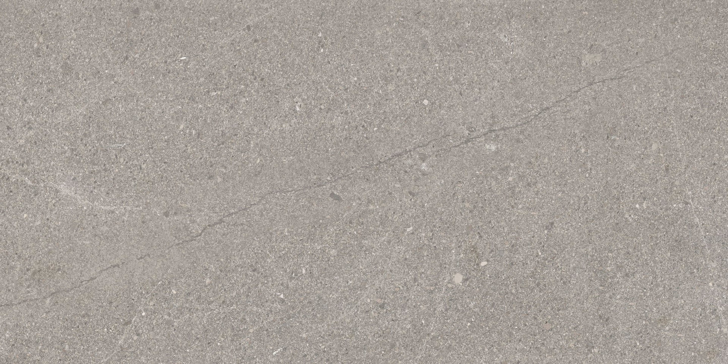 This is an up-close image of the tile  sandwaves in the color chateau gray